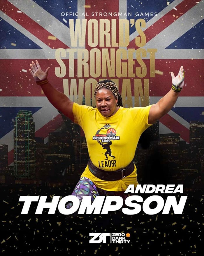 Female athlete celebrating with arms raised in front of Union Jack flag at World's Strongest Woman competition.