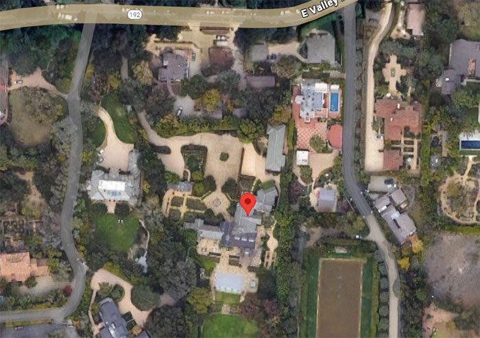 Aerial view of a residential area marked with a location pin, related to Katy Perry lawsuit support news.