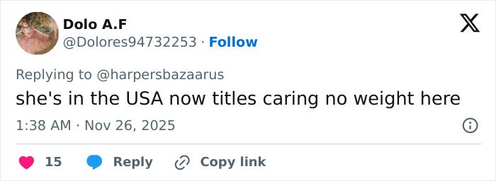 Screenshot of a Twitter reply criticizing Meghan Markle amid backlash over her royal gesture.