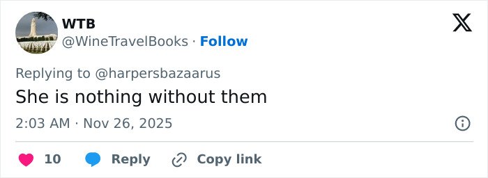Screenshot of a Twitter reply criticizing Meghan Markle amid backlash over an awkward royal gesture controversy.