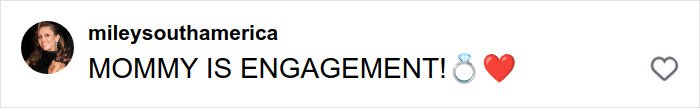 Comment reading MOMMY IS ENGAGEMENT with ring and heart emojis on Miley Cyrus and Maxx Morando's engagement post sparking mixed reactions.