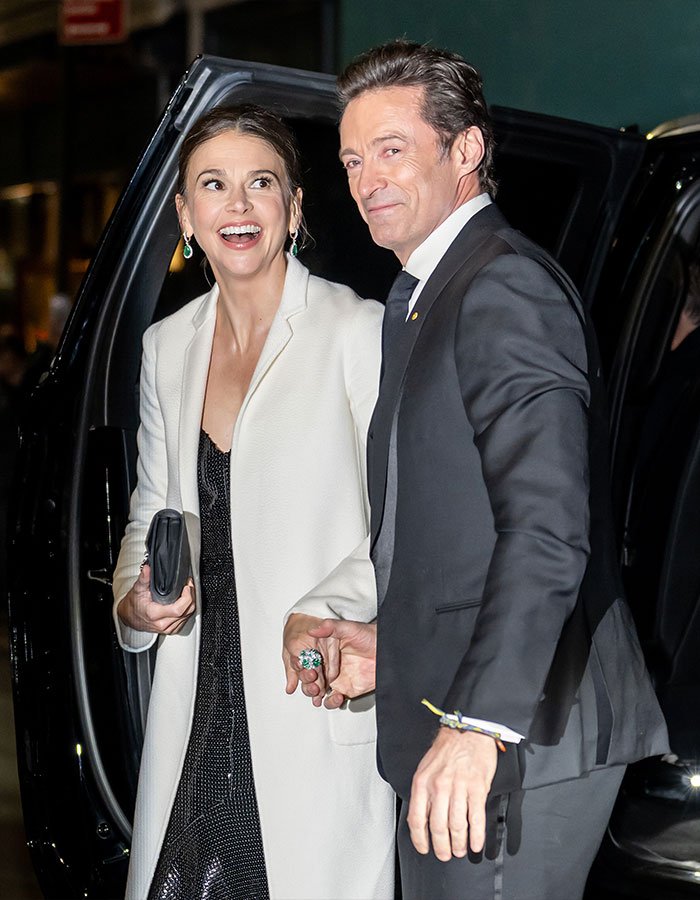 Hugh Jackman and Sutton Foster arriving at red carpet event amid divorce controversy, fans reacting strongly.