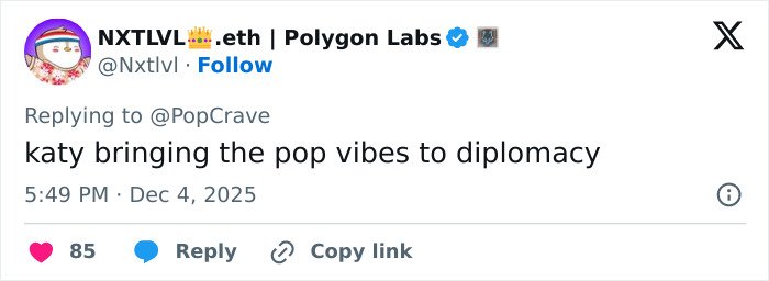 Justin Trudeau and Katy Perry meeting Japan's Ex-PM, blending pop culture with diplomatic elegance.