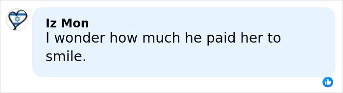 Comment on social media post saying "I wonder how much he paid her to smile" shown on a light blue background.