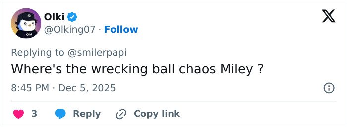 Screenshot of a social media reply commenting on Miley Cyrus’s youthful glow and viral makeover after taking veneers out.