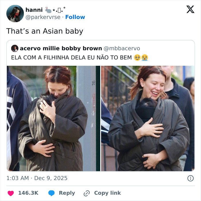 Millie Bobby Brown smiling while holding her newborn daughter outdoors in a viral theory about Millie Bobby Brown's newborn daughter.