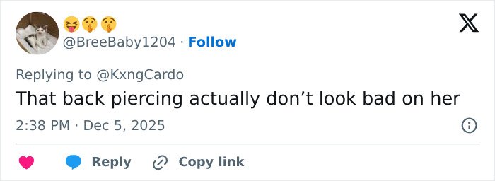 Social media user commenting on Cardi B&rsquo;s new neck and back piercings amid mixed reactions online.