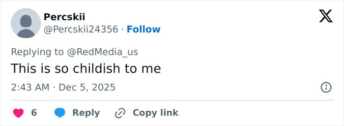 Screenshot of a social media reply criticizing Cardi B after getting new neck and back piercings with negative comments.
