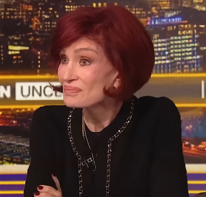 Sharon Osbourne speaking on a TV set with a cityscape background, discussing Kelly&rsquo;s heartbreaking weight loss.