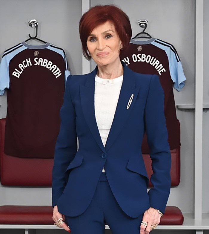 Sharon Osbourne in navy suit standing in front of jerseys, addressing Kelly&rsquo;s heartbreaking weight loss in a formal setting
