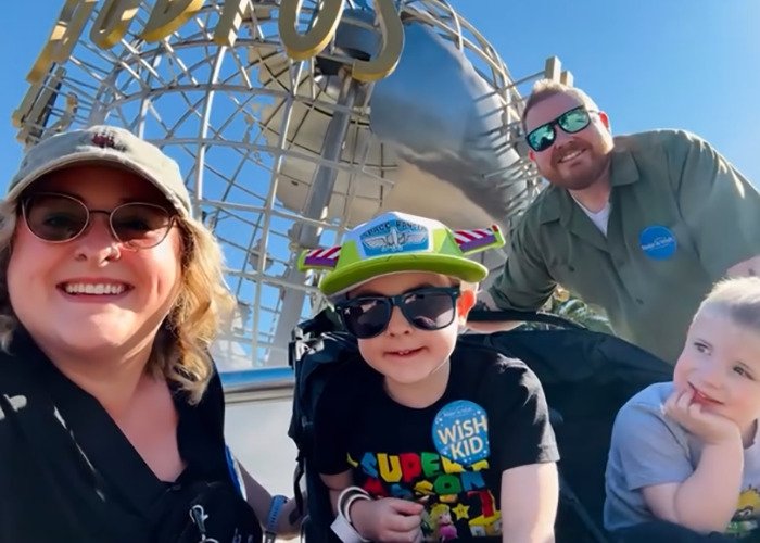 Family with terminally ill kids enjoying a day out, highlighting the mom involved in the Hilary Swank apology controversy.