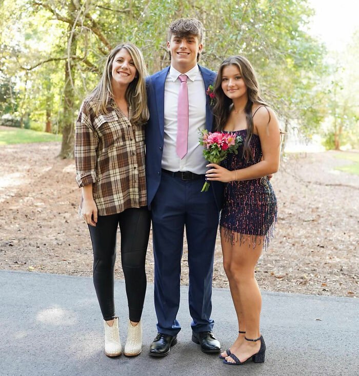 Mother and son posing outdoors during viral mother-son photoshoot sparking heated parenting debate.