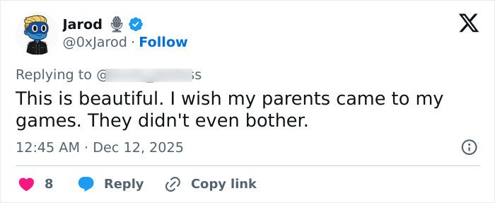 Screenshot of a social media reply discussing feelings about parenting in relation to a viral mother-son photoshoot debate.