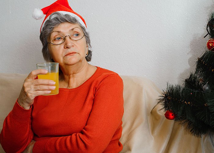 Elderly woman upset with son’s partner for coming without a gift after asking to avoid tacky little trinkets during holiday.