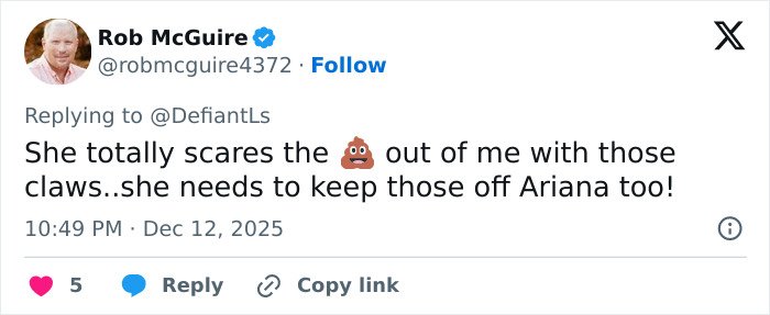 Tweet from Rob McGuire reacting to Cynthia Erivo’s oddly large hands sparking a debate on her demon-like appearance.