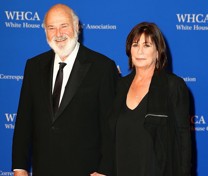 Man and woman posing together at a formal event, related to son eyed as person of interest after grisly LA home scene