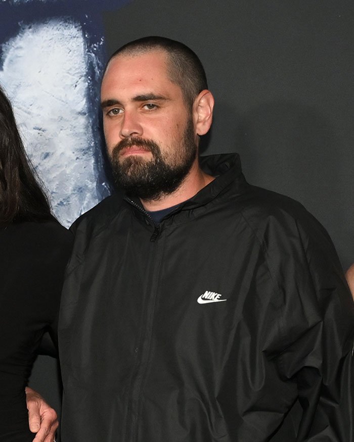 Man with beard wearing a black Nike jacket, related to Rob Reiner and son Nick fight before fatal incident news.