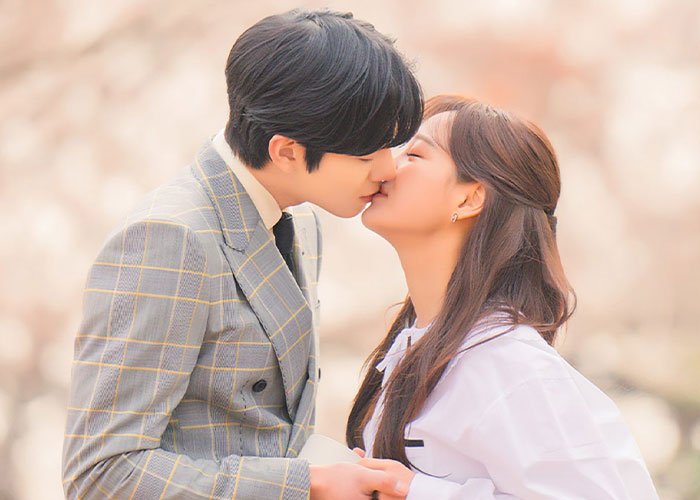 Young Korean couple sharing a romantic kiss, portraying K-Drama-style date moments and intimate encounters scene.