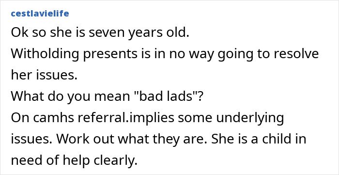 Screenshot of online comment discussing a mom withholding Christmas gifts as punishment for her 7-year-old child.