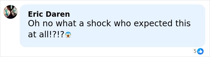 Comment by Eric Daren expressing shock with an emoji, reacting to a chilling toddler's foot appearing in photo beside Epstein.