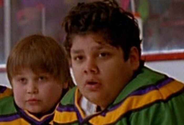 Two young actors in vintage hockey jerseys, representing Tylor Chase&rsquo;s co-star breaking silence on homelessness.