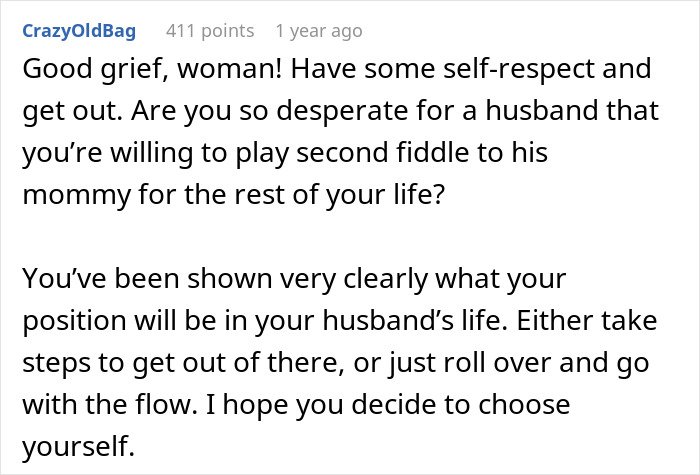 Comment discussing a mother-in-law deciding to wear a white dress to her son's wedding and causing tension with the bride.