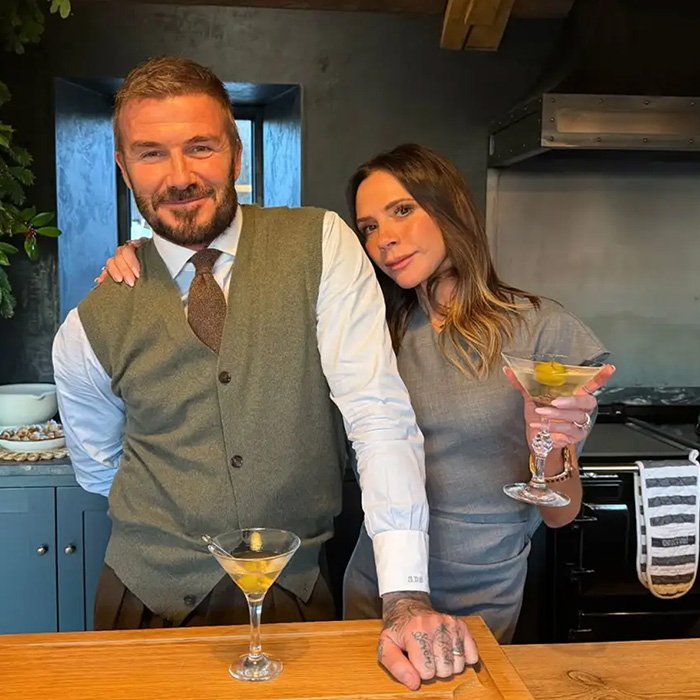 David Beckham and Victoria posing in a kitchen, fans discuss Brooklyn’s wife Nicola Peltz and Victoria’s Christmas posts.