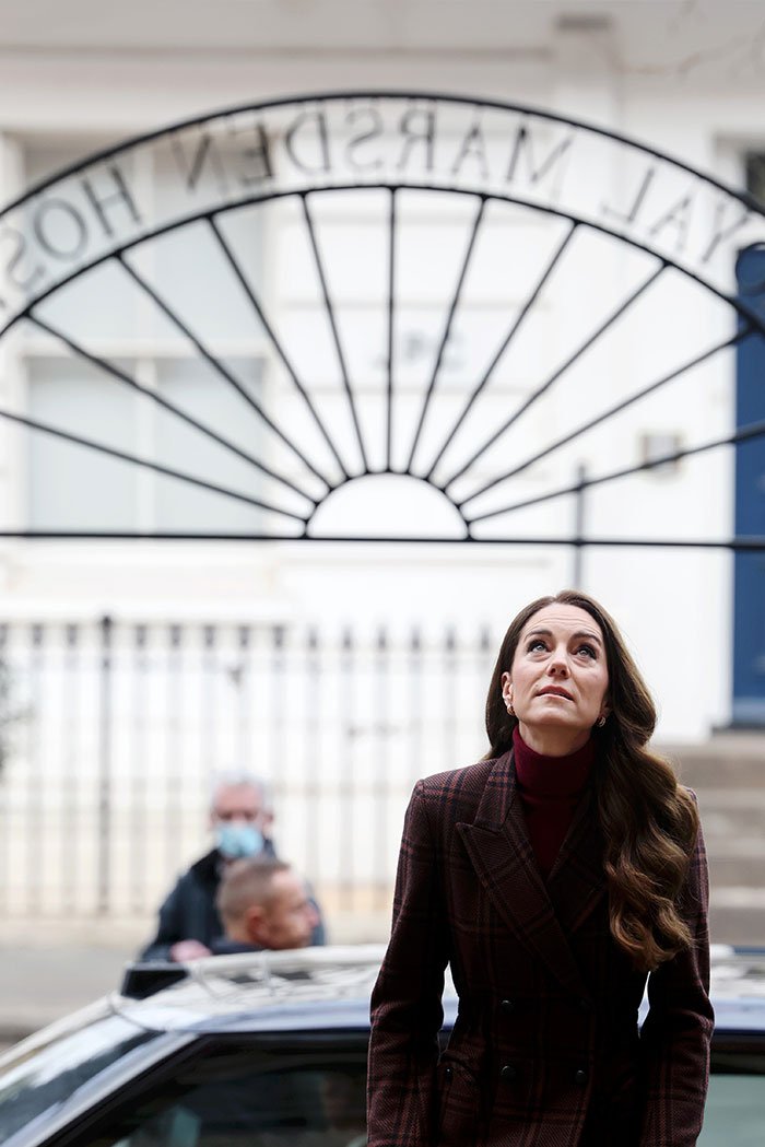 Kate Middleton during Christmas appearance sparking wild conspiracy theories about her scar and cancer rumors.
