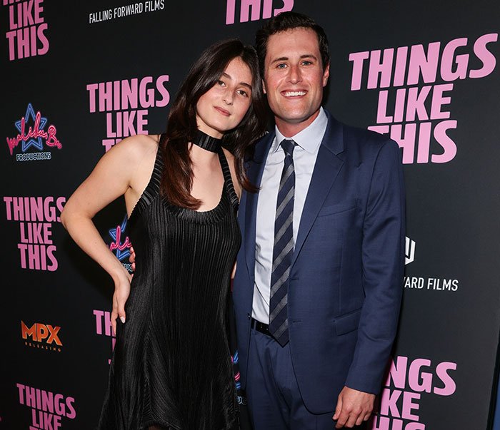 Jake and Romy Reiner posing together at a film event, breaking silence after brother Nick gets charged.