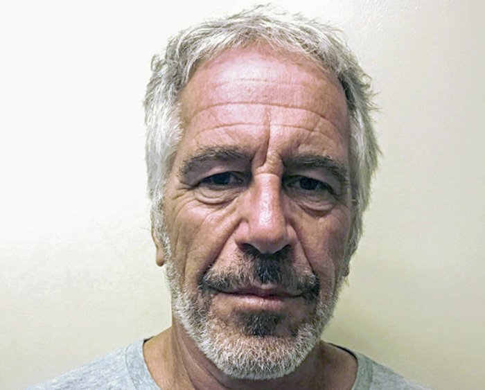 Mugshot of man with gray hair and beard related to chilling toddler's foot photo beside Epstein in new files exposed