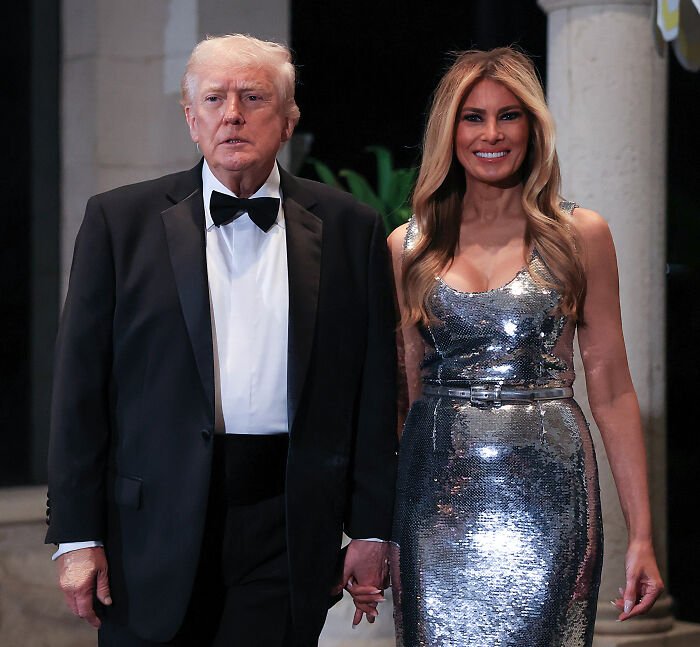 Melania Trump and Donald Trump dressed formally at Mar-a-Lago event with Melania’s body language drawing attention.