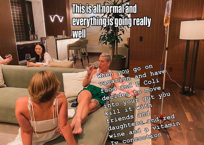 Pink relaxing with friends and drinking wine at home after spending New Year’s Eve alone in hospital receiving IV treatment.
