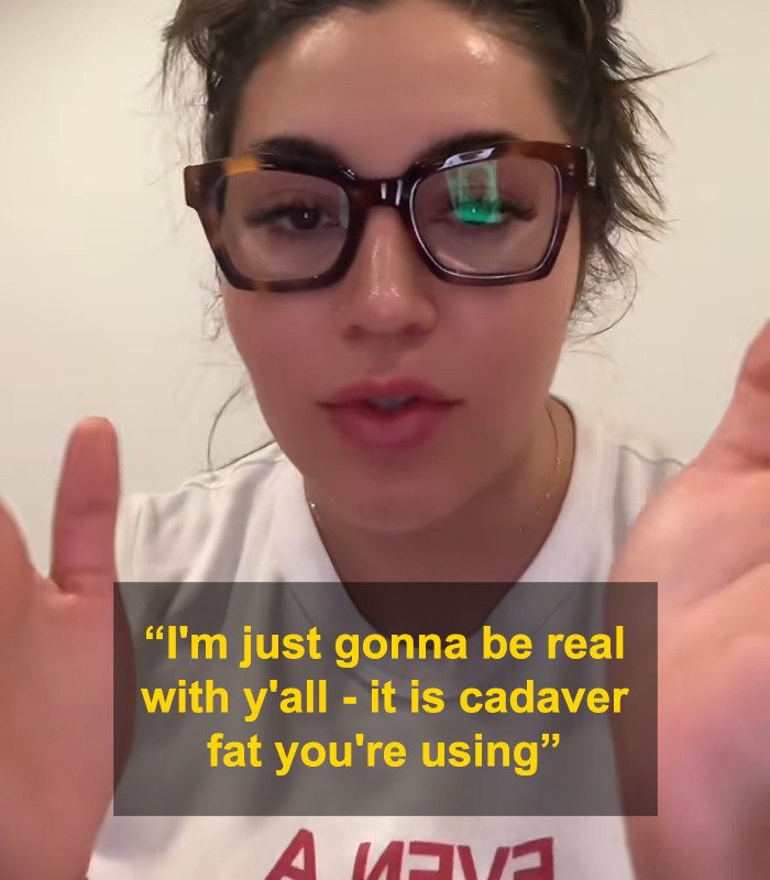 Close-up of a woman wearing glasses explaining the use of cadaver fat in BBLs and breast implants procedures.