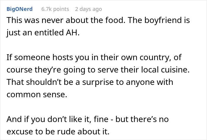 Screenshot of a social media comment criticizing a boyfriend’s rude reaction to traditional gross food instead of American dishes.