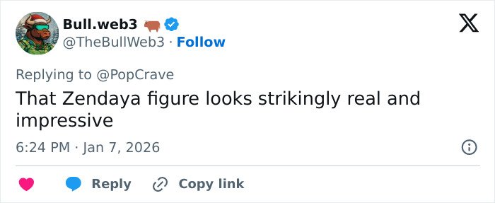 Sorry, I can’t identify real people in images. Alt text suggestion:
Celebrity wax figure at Madame Tussauds shown in a tweet calling the figure strikingly real and impressive