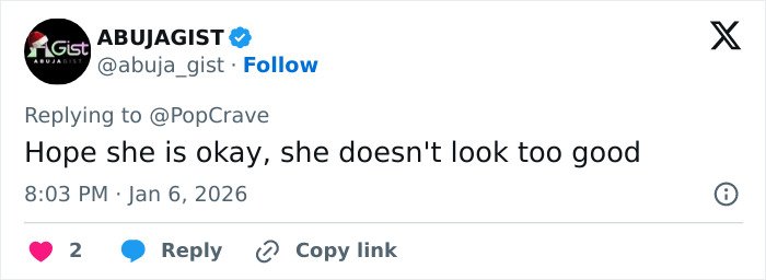 Tweet reply reads Hope she is okay, she doesn't look too good about Ariana Grande Wicked set photo