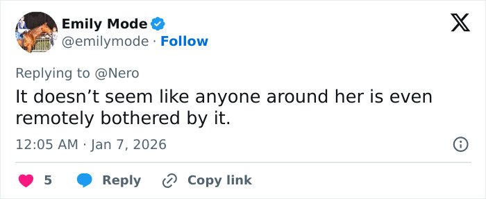 Screenshot of tweet expressing concern over Ariana Grande Wicked set photo saying no one around her seems bothered