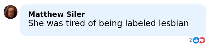 Social media comment reading She was tired of being labeled lesbian with like and love reactions