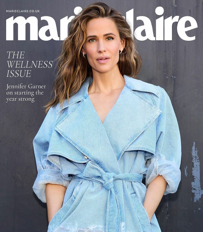 Jennifer Garner on the cover of Marie Claire wearing a light blue denim jacket, discussing trauma bonding and divorce.