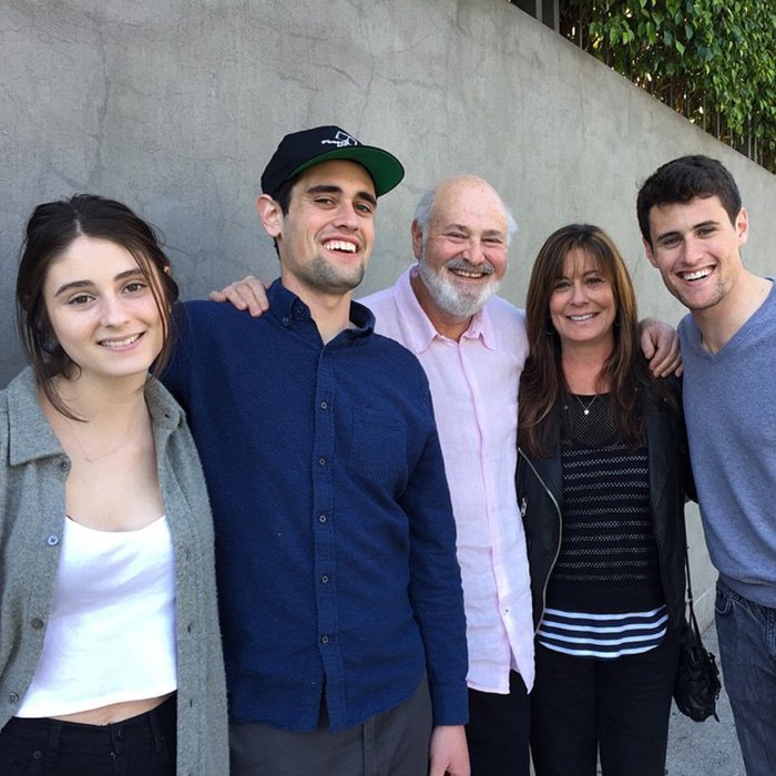 Nick Reiner’s family posing together outdoors, smiling and showing support amid sudden lawyer quitting the case.