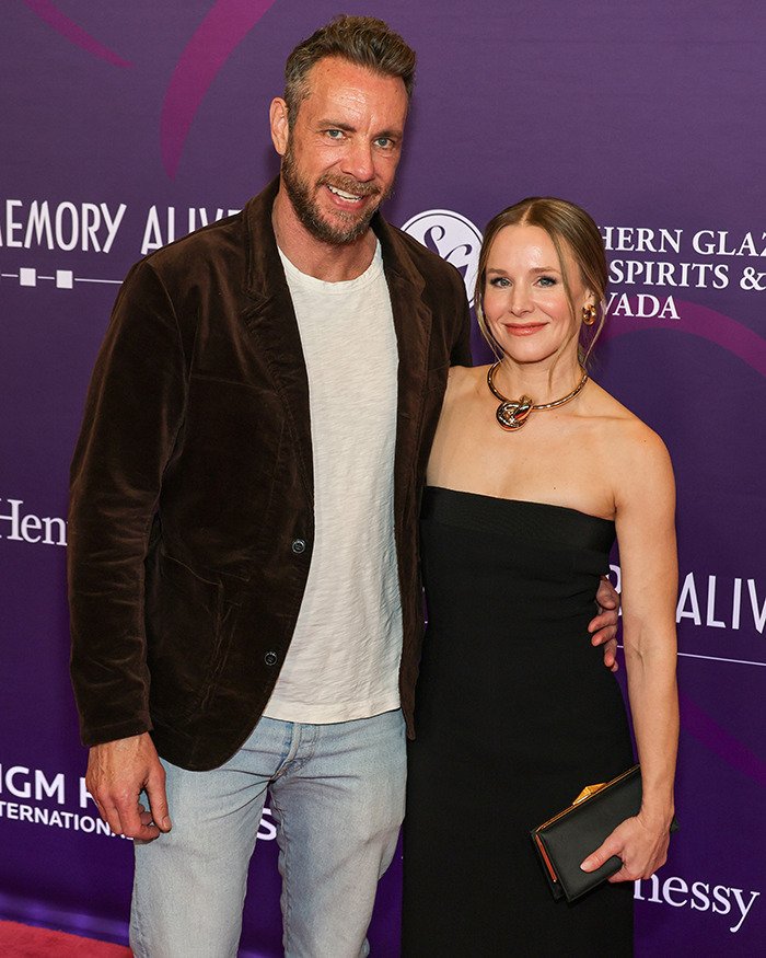 Dax Shepard and a woman posing together at a red carpet event, related to freezing eggs discussion.
