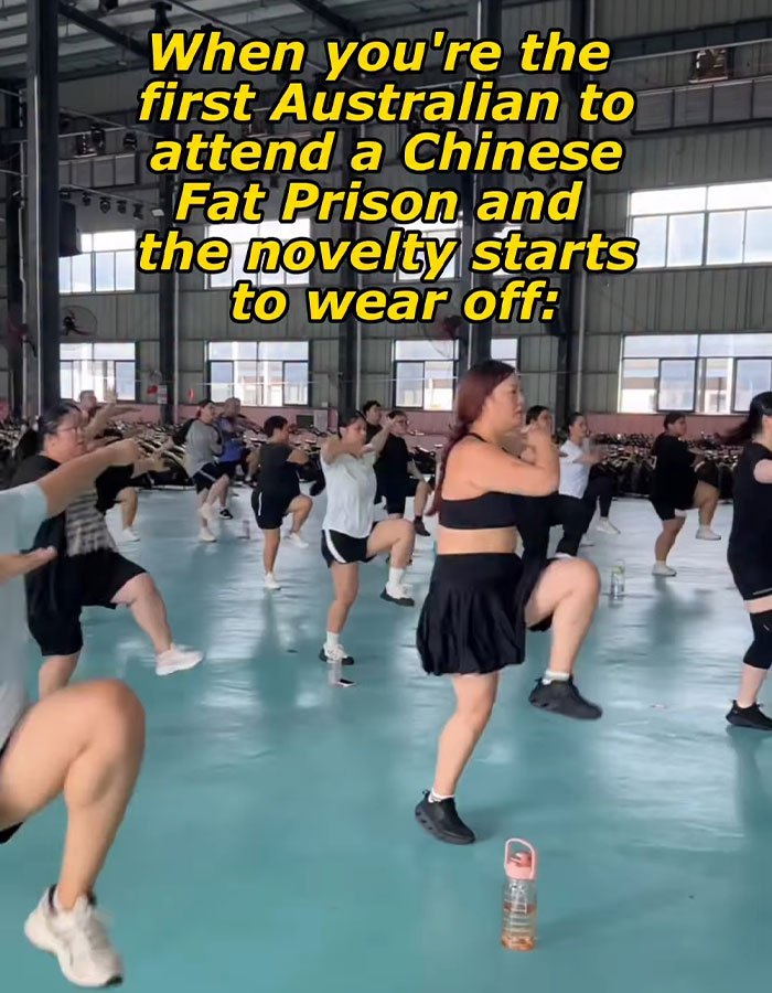 Group of women exercising indoors in a large facility, illustrating conditions of the fat prison experience.