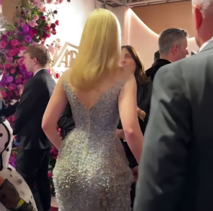 Elle Fanning’s height stuns as women are getting bigger, towering over stars at the Golden Globes event.