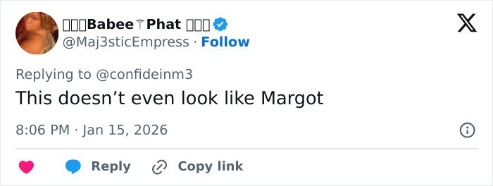 Screenshot of a tweet criticizing Margot Robbie's underwater cover shoot, questioning its approval and appearance.