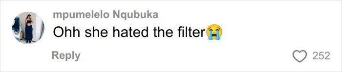 Comment from South African fan reacting to Dua Lipa using a filter on their selfie together with crying emoji.