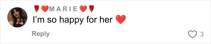 Comment from user Marie with heart emojis expressing happiness for Meghan Trainor amid surrogate baby discussion.