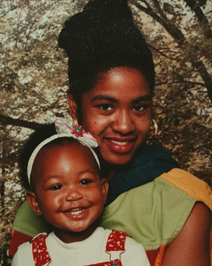 Smiling young woman holding a happy toddler girl, related to five-year-old’s chilling last words before disappearance in Alligator Alley.