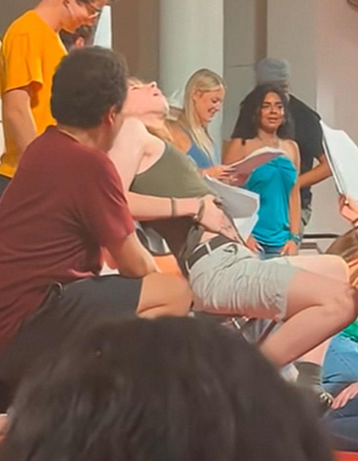 Students participating in a controversial orientation ceremony at Amherst College sparking backlash and administrative firings.