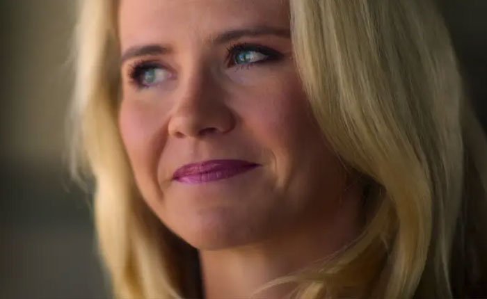 Close-up of a woman with blonde hair and blue eyes, featured in Elizabeth Smart Netflix documentary Kidnapped.
