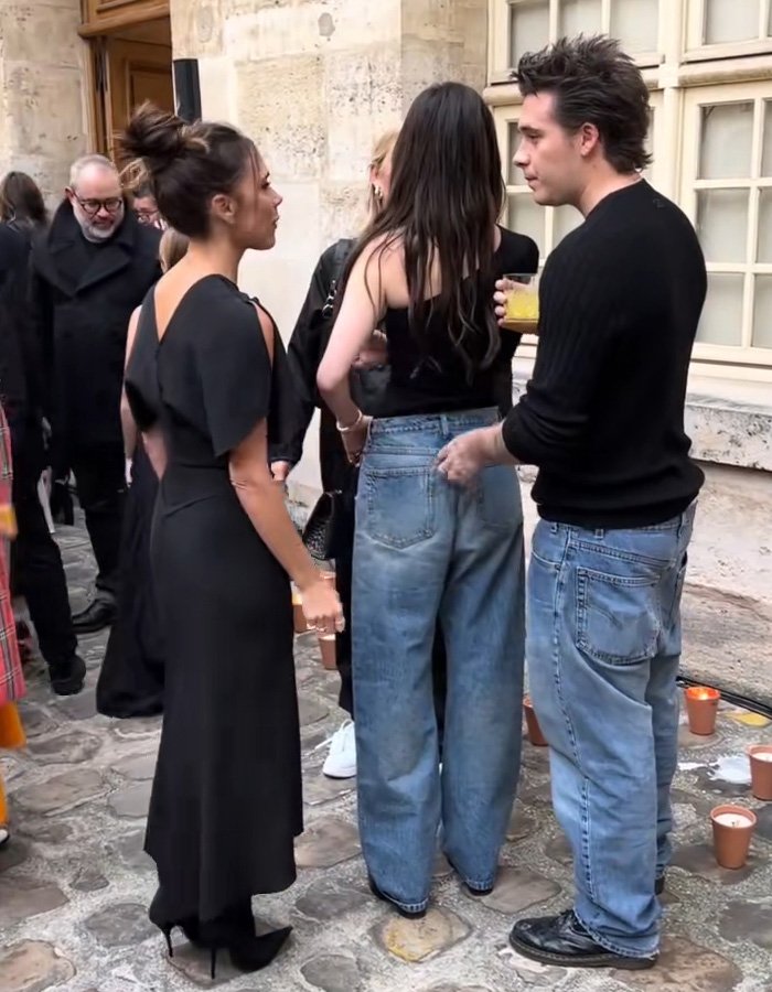 Victoria Beckham and Nicola Peltz engage in a tense exchange during a public event amid feud rumors.
